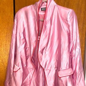 Satin pink pants suit, trimmed in red.